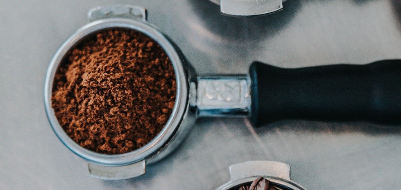 portafilter with espresso in it